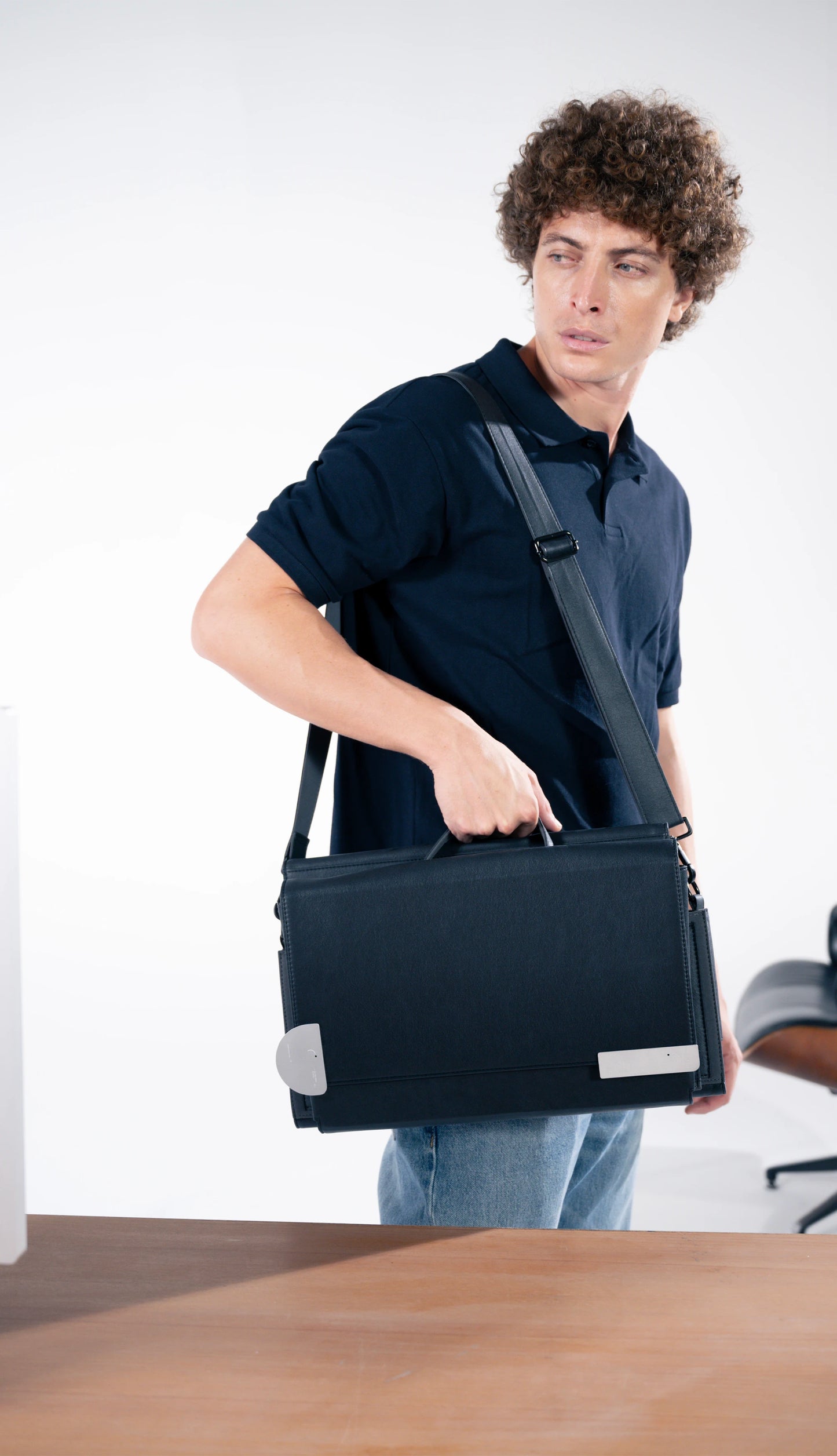 Modern black brief with metal accents to increase functioanlity