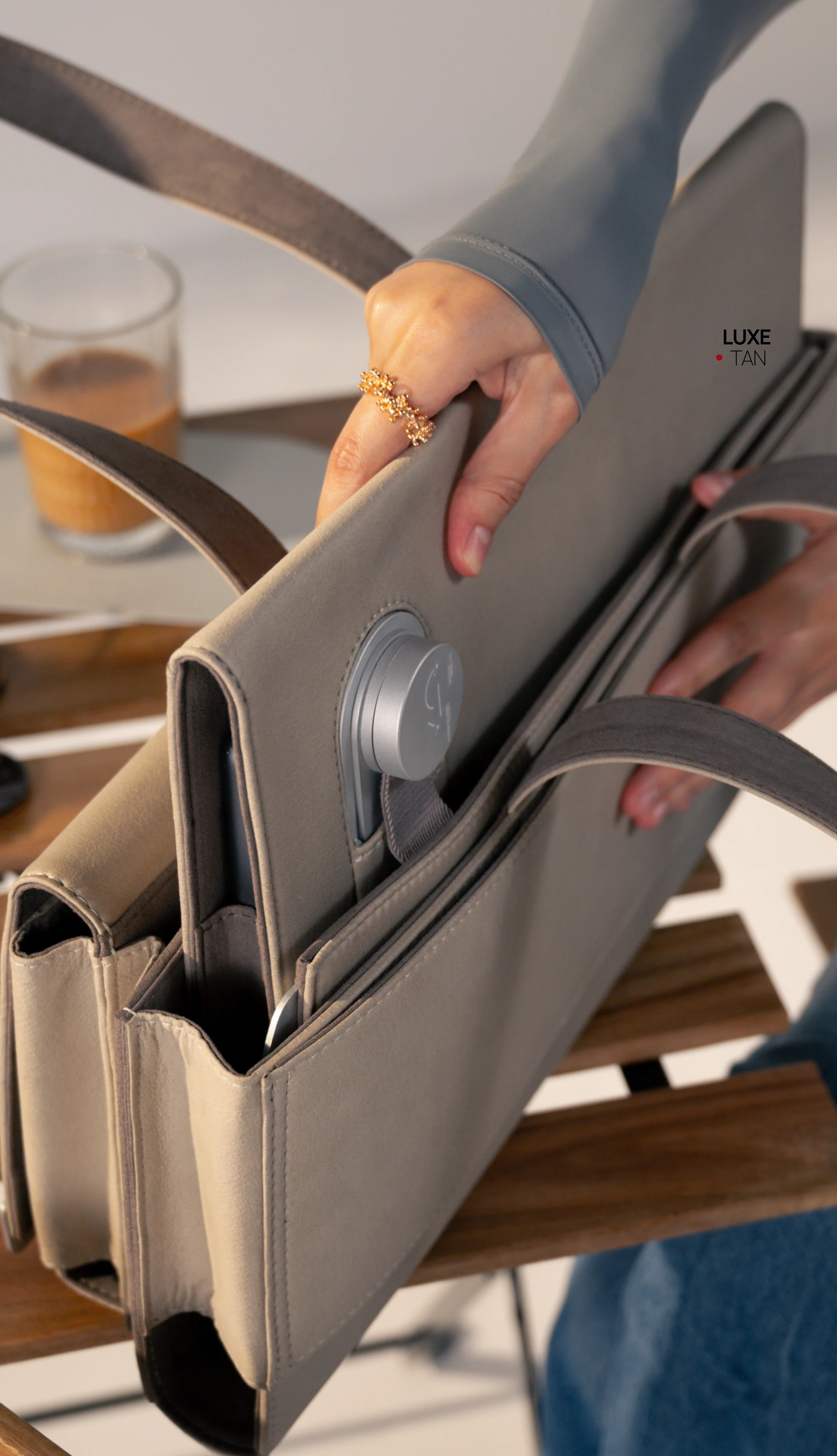 The folio seamlessly sliding into the charcoal tote